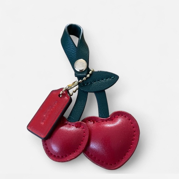 Coach Handbags - Small Coach Bag tag & unbranded cherry bag charm